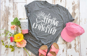 She Is Strong But She Is Exhausted Graphic Tee